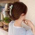Elegant large light blue tulip flower hair claw clip shown in hair for women - Light Blue Tulip-YZAP45-8