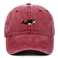Vintage washed burgundy baseball cap with detailed orca embroidery on the front - Orca Embroidery Style / Burgundy