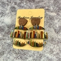 Detail of bookshelf printed acrylic earrings with wood geometric tops and classic book titles - Wood Geometric Splicing Round Dangles