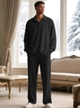 Detail of men's black long-sleeve polo lounge set with diamond knit texture in indoor setting - S / Black