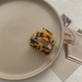 Detail of a rectangle amber tortoiseshell hair claw clip in a glossy polished finish - Small Square Claw / Dark Tortoise
