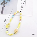 Handmade beaded phone strap featuring yellow and white beads with a smiley face charm - Smiley Face Square (K1073)