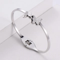Bracciale rigido minimalista in acciaio argento con doppi ciondoli a farfalla opachi e lucidi - Color Acciaio