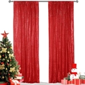 Close-up of red sequin fabric texture with festive holiday decor and gift boxes - Red