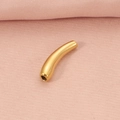 Golden titanium steel curved tube charm for jewelry making on pink textured background - Gold Curved Tube Pendant
