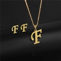 Detailed view of gold letter F pendant necklace and matching stud earrings set - Letter F / Gold