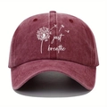 Detail of burgundy washed cotton baseball cap featuring dandelion and just breathe print - One Size / Burgundy