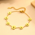 Elegant gold daisy flower bracelet set in stainless steel on a soft beige texture - 7 Daisy Bracelet Gold (B417)
