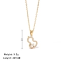 Collier doré avec pendentif gourde, pierre précieuse verte et zircons blancs brillants - Or-Strass Blanc