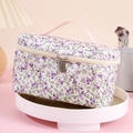 Portable floral toiletry bag with purple flower pattern and dual zippers for storage - Purple Floral