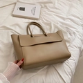 Minimalist mocha faux leather large capacity tote bag with top handle on white linen - Khaki