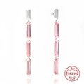 Detail of 925 sterling silver drop earrings featuring rectangular pink gemstones and chains - Platinum-Pink Rectangle Gem