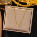 Minimalist 18K gold plated titanium necklace with round zircon pendant on display - Single Diamond Necklace (XLH168) / Gold