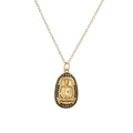 Collier pendentif Bouddha doré avec zircons noirs et chaîne en O sur fond blanc - Pierre Précieuse Noire Bouddha Assis