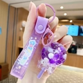 Purple iceberg milk tea liquid sand keychain with round beads and cartoon wrist strap - Fresh Lollipop - Purple