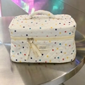 Quilted cotton vanity bag with colorful polka dots, top handle, and dual zipper closure - Colorful Polka Dots