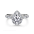 Macro shot of pear-shaped halo engagement ring with micro-paved sparkling cubic zirconia - Pear-shaped Platinum White Stone