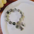 Vintage green natural stone beaded bracelet with silver fortune cat charm and tassel decor - Green Ghost: Three Pendants Lotus Fortune Cat