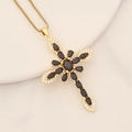 Macro shot of 18K gold cross pendant featuring black oval gem and white zircon accents - 8# Black