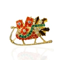 Golden Christmas maple leaf sled brooch with colorful rhinestones and enamel finish - Christmas Sleigh