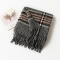 Classic plaid scarf in grey and brown with tassels, folded on a clean white background - Black Beige