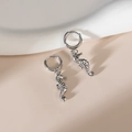 Elegant silver seahorse-shaped hoop earrings in a minimalist stainless steel design - Steel Color - Seahorse Shape