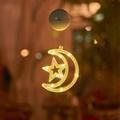 Detailansicht der LED-Saugnapfleuchte in Stern- und Mondform mit warmweißem Licht - Warmweiß Mond und Stern