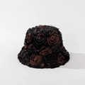 Detailed close-up of 3D rose petal textures on a plush faux fur winter bucket hat - M (56-58cm) / Black