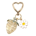 Detail of strawberry keychain with gold foil filling and white daisy charm - Gold Foil Clear Strawberry White Daisy