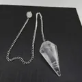 Clear quartz crystal pendulum with silver chain for meditation on black background - White Crystal