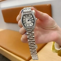 Elegant silver tonneau-shaped ladies watch with rhinestone bezel and metal strap - Silver Case White Dial Silver Steel Strap