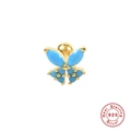Detail van vlinder oorsteker in 925 zilver met turquoise edelstenen en gouden finish - Goud Enkel-Turkoois