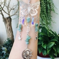 Detailed silver suncatcher with butterfly, moon, and raw green crystal stones - Green Aventurine