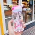 Pink and blue cute cartoon dinosaur kids plastic straw cup with handle and flip lid - 16oz / Dino Pink