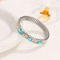 Elastic silver watch strap bracelet with three oval blue crystals and gold accents - Blue Oval Gemstone Style (14)