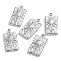 Macro detail of five silver square tarot pendants with sunburst and hammered textures - Rectangular-Steel Color