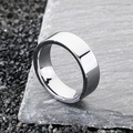 Polished silver 8mm wide tungsten steel ring for men on rustic slate background - US 9 / Steel