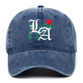 Detail view of gothic LA embroidery with red rose and green thorns on blue cotton cap - Navy Blue