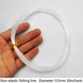 Hand holding 0.5mm non-elastic transparent nylon fishing line for crafts, 30m bundle - Non-elastic Fishing Line