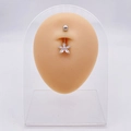Silver flower belly ring with clear cubic zirconia on a mannequin for belly piercing - Simple Five-Petal Flower