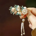 Detail of vintage enamel butterfly hair clip with white pearls and long tassel drop - F1427 Enamel Flower