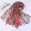 Detail shot of multi-color floral cotton linen scarf with soft fringe and ethnic patterns - Style 10