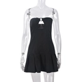 Detail of black strapless mini dress featuring chest cutout and metal buckle closure - S / Black