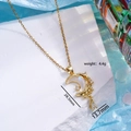Collana luna dorata con zirconi e intarsio in madreperla su base di pietra bianca - Oro/Bianco Perlato