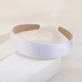 Elegant white satin wide headband with non-slip lining on geometric display stand - White