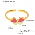 Macro detail of a golden stainless steel ring featuring a pink and white oil drip butterfly - Gold Butterfly Enamel Ring (TXA260)