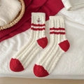 Thick warm winter socks with snowman embroidery and red striped cuffs on white fuzzy fabric - One Size / Snowman