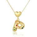 Macro shot of gold letter P heart pendant with colorful zircon stones on a box chain - Letter P