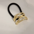 Minimalist elastic hair tie with hammer-textured golden wavy metal accent in gold finish - Pattern Line Gold