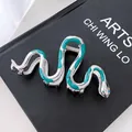Pinza de pelo serpiente en metal plateado con acabado de esmalte jaspeado verde - 10.5cm / Plateado Verde
